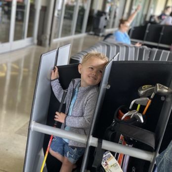 Topgolf - My baby bringing his own golf clubs - New American Near Me - Austin, Texas