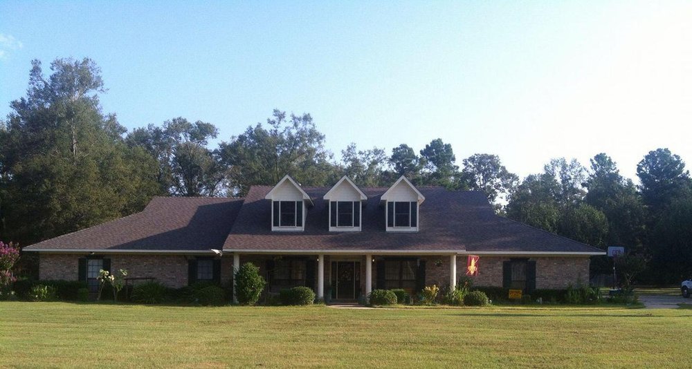 Slide of Cross Roofing and Construction