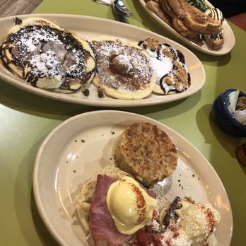 Snooze, an A.M. Eatery - benny duo and bella benny in the back, with a flight of pancakes to share ;) - Breakfast & Brunch Near Me - Orange, California