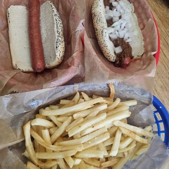 Mustard's Last Stand - Two hotdogs with fries and one with chili & onions - Hot Dogs Near Me - Melbourne, Florida Mustard's Last Stand - Two hotdogs with fries and one with chili & onions - Hot Dogs Near Me - Melbourne, Florida