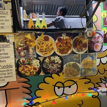 Tapas Kitchen - a food truck with menus on the side - Food Trucks Near Me - Honolulu, Hawaii