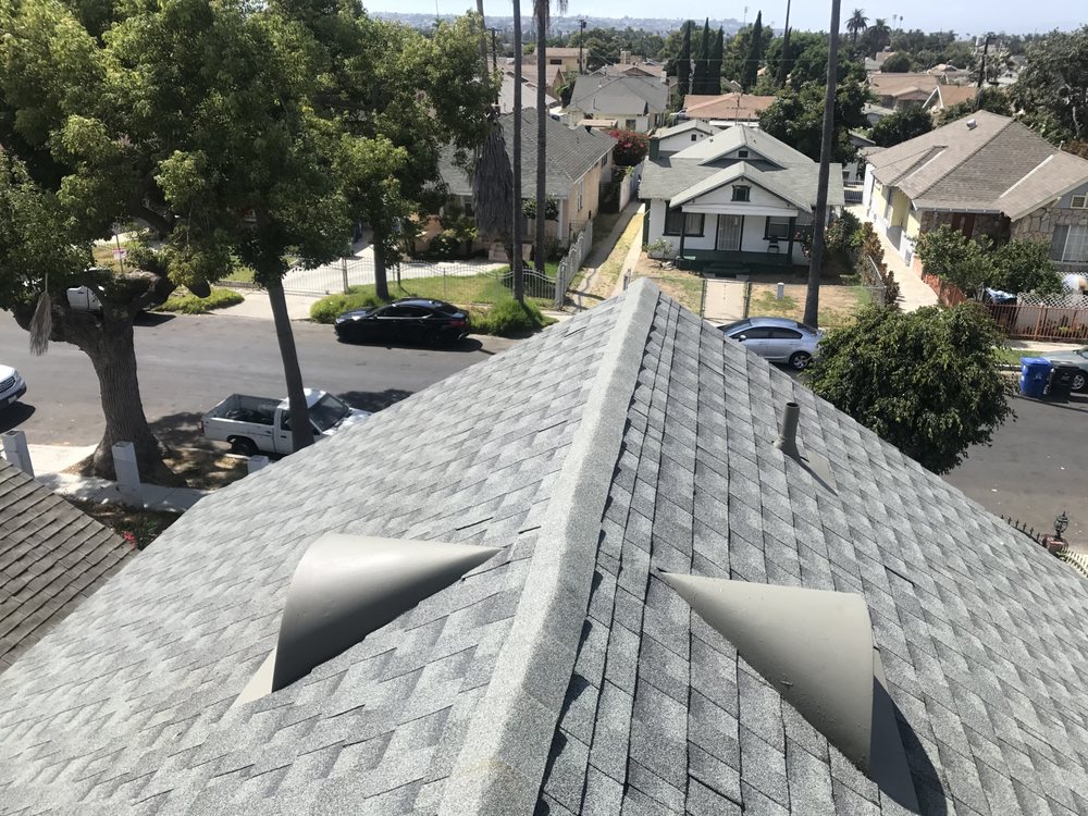 Slide of New Era Skilled Roofing
