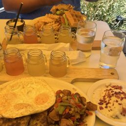 Mimosa Flights, Breakfast Plate with Biscuits & Gravy, and Waffle Sandwich! Mimosa Flights, Breakfast Plate with Biscuits & Gravy, and Waffle Sandwich!