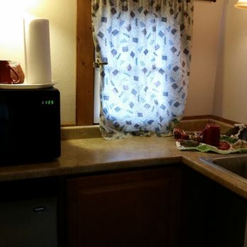 Oasis Cabin Resort - The tiny cabin kitchen...with microwave (pretty clean inside) and a frig...and counterspace. - Rafting/Kayaking Near Me - Maupin, Oregon Oasis Cabin Resort - The tiny cabin kitchen...with microwave (pretty clean inside) and a frig...and counterspace. - Rafting/Kayaking Near Me - Maupin, Oregon