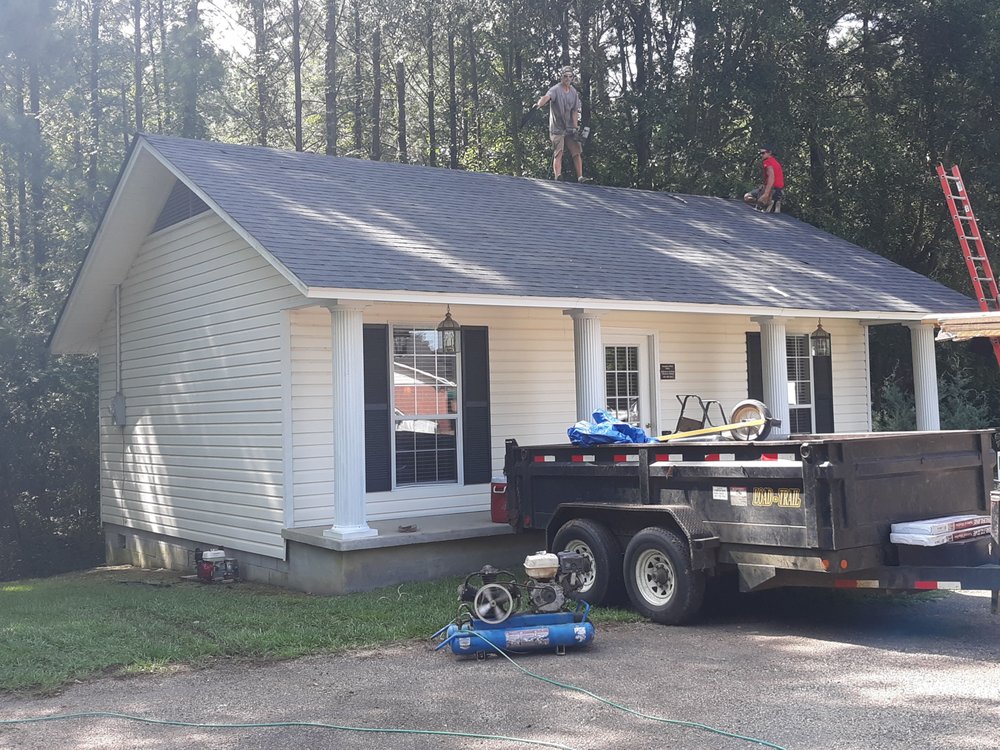 Slide of Tha Roofing company