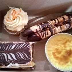 La Provence Bakery - Cupcake, spongy cookie sandwich, mille-feuille, and flan.