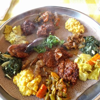 Harambe Restaurant - The chef's choice platter! The meats and lentils were delicious, and the veggies were nice too. There's also a vegetarian platter. - Ethiopian Near Me - Vancouver, British Columbia