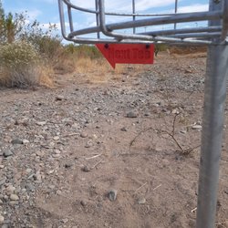 Skunk Creek Disc Golf Course - When the tees are not in a straight line, these little arrows point the way to the next one.