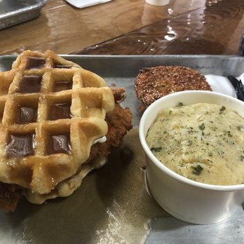 Se7enBites - The Minnie Pearl- my favorite Chicken + Waffles in Florida, hands down! Comes w/ grits (and I got a side of fried green tomatoes) - Coffee & Tea Near Me - Orlando, Florida Se7enBites - The Minnie Pearl- my favorite Chicken + Waffles in Florida, hands down! Comes w/ grits (and I got a side of fried green tomatoes) - Coffee & Tea Near Me - Orlando, Florida
