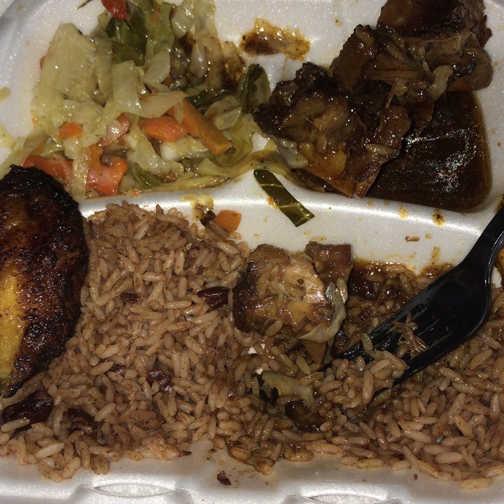 Golden Krust - Small oxtails with peas and rice side of cabbage and plantains. - Caribbean Near Me - Morrow, Georgia
