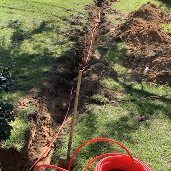C Squared Designs - a trench with a hose attached to it - Door Sales/Installation Near Me C Squared Designs - a trench with a hose attached to it - Door Sales/Installation Near Me