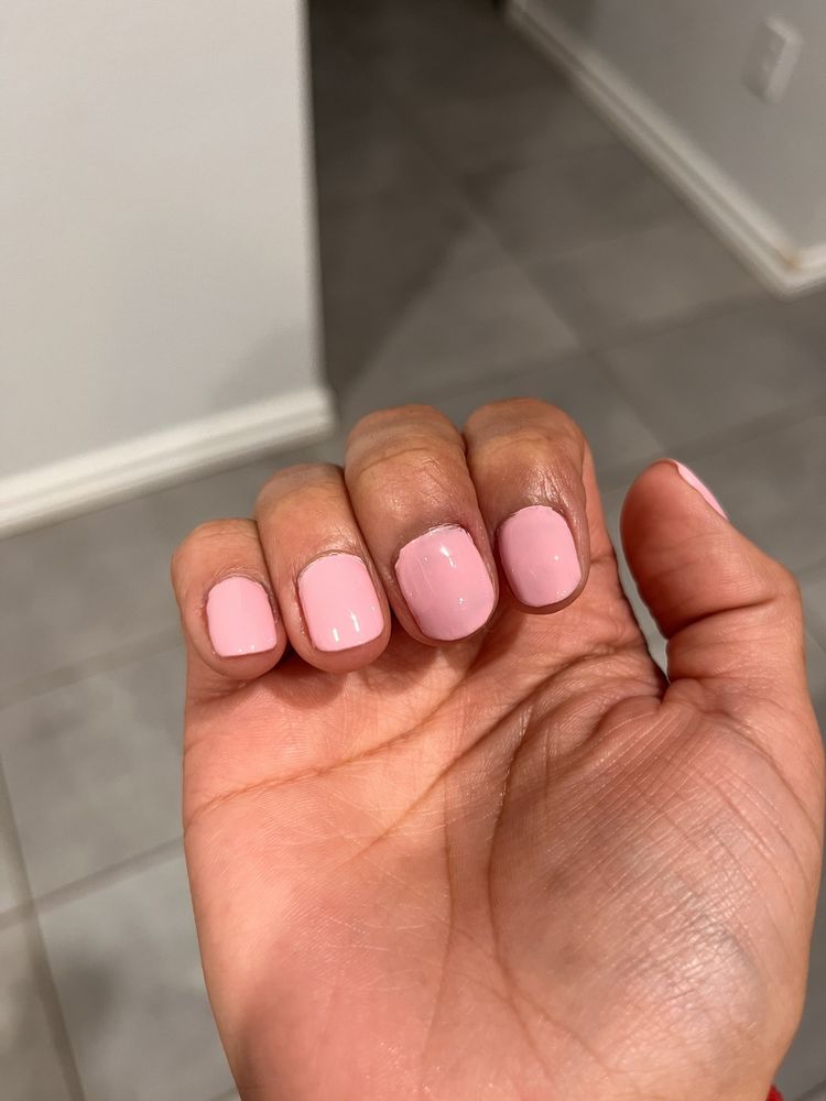 Unique Nail & Spa Logo