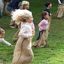 The Serra Preschool - Potato sack race at the Serra family picnic