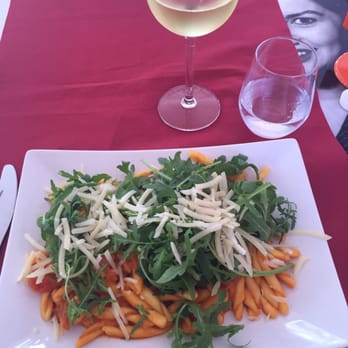 Pastamania Italia - A variation of fusilli pasta called trofie with fresh tomatoes, basil, arugula, and cheeeese - Italian Near Me - Pisa, PI