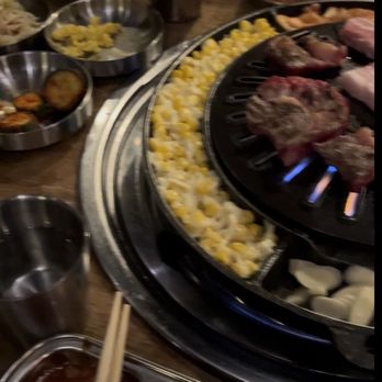 Daldongnae Korean BBQ - Cummer - Unlimited sides and Grill with rib eye and pork belly on it. You can also view the creamy corn on the side of the grill, keeps it warm. - Korean Near Me - Toronto, Ontario Daldongnae Korean BBQ - Cummer - Unlimited sides and Grill with rib eye and pork belly on it. You can also view the creamy corn on the side of the grill, keeps it warm. - Korean Near Me - Toronto, Ontario