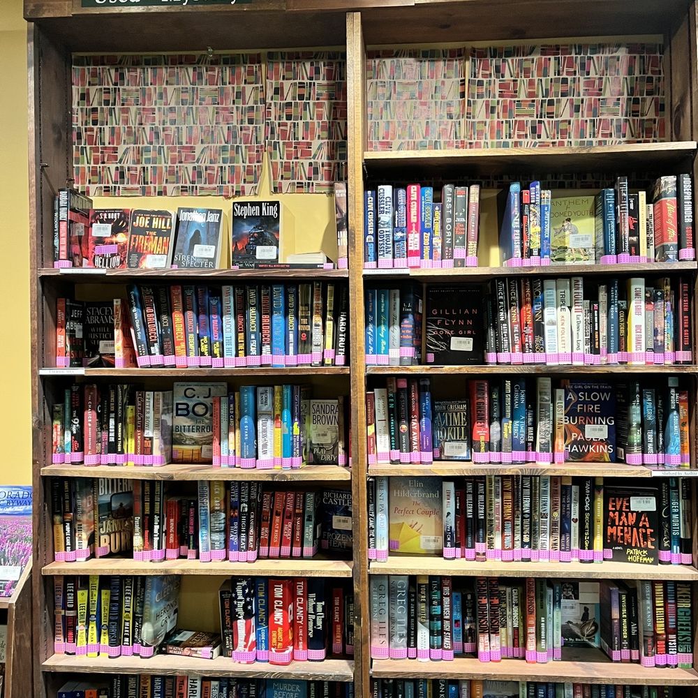 a bookshelf full of books a bookshelf full of books