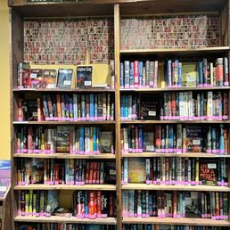 a bookshelf full of books a bookshelf full of books