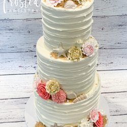 Frosted Artistry - Buttercream wedding cake with chocolate seashells & sugar flowers