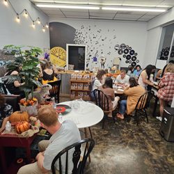 Curious Collections Vinyl Records & More - Listening room with room to study