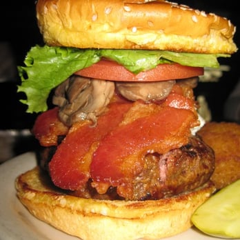 Vortex Bar & Grill - The Blue 'Shroom burger, with bacon, mushrooms, and blue-cheese spread. - American Near Me - Atlanta, Georgia Vortex Bar & Grill - The Blue 'Shroom burger, with bacon, mushrooms, and blue-cheese spread. - American Near Me - Atlanta, Georgia
