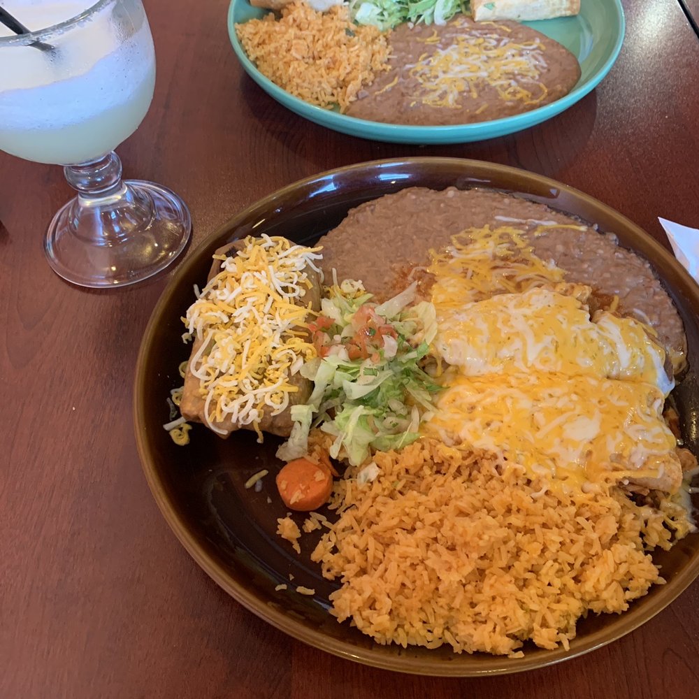 3 combo plate with chimichanga, tamale, and enchilada. 3 combo plate with chimichanga, tamale, and enchilada.