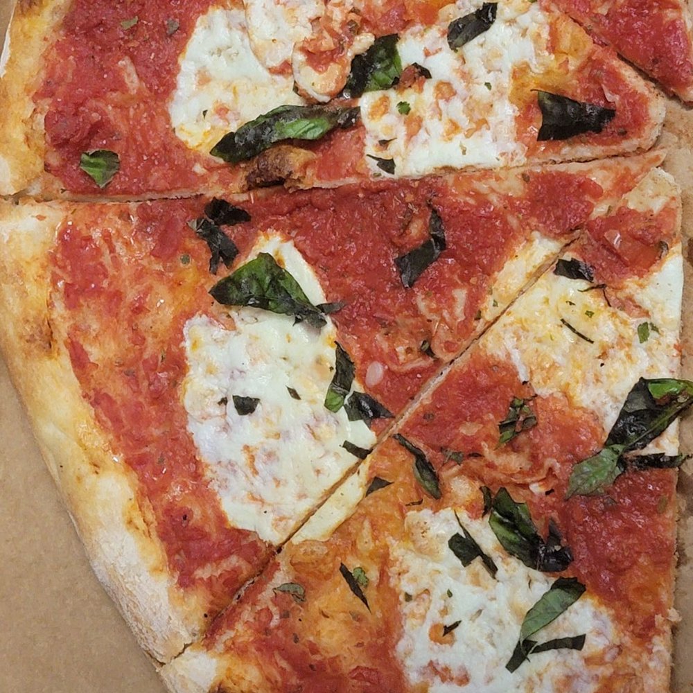 Margherita pizza. No, I did not mess with it at all. This is how it looked when I opened the box. Margherita pizza. No, I did not mess with it at all. This is how it looked when I opened the box.