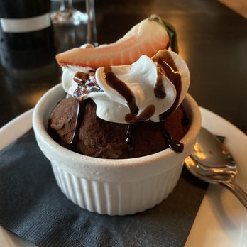 Remingtons of Niagara - Chocolate ice cream dusted in cocoa powder with whipped cream and a strawberry slice - Steakhouses Near Me - Niagara Falls, Ontario Remingtons of Niagara - Chocolate ice cream dusted in cocoa powder with whipped cream and a strawberry slice - Steakhouses Near Me - Niagara Falls, Ontario
