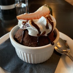 Remingtons of Niagara - Chocolate ice cream dusted in cocoa powder with whipped cream and a strawberry slice