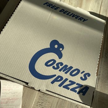 Cosmo’s Pizza - a pizza box on a table - Pizza Near Me - Lafayette, Colorado