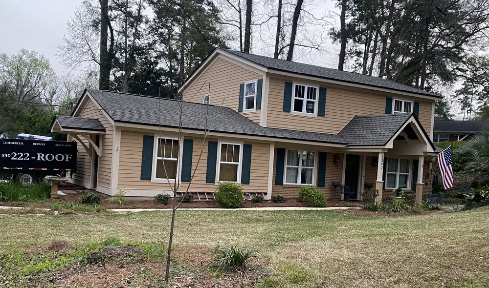 Slide of Total Quality Roofing