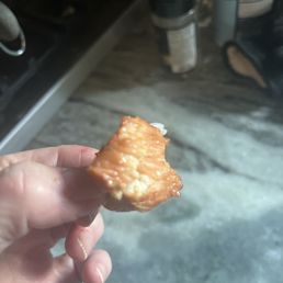 This piece of sesame chicken was old and hard and fell right out of its breading. This piece of sesame chicken was old and hard and fell right out of its breading.