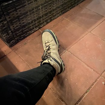 Rain Dothan - a person's feet and shoes on a tiled floor - Bars Near Me - Dothan, Alabama Rain Dothan - a person's feet and shoes on a tiled floor - Bars Near Me - Dothan, Alabama