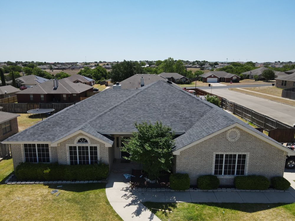 Slide of Denali Roofing