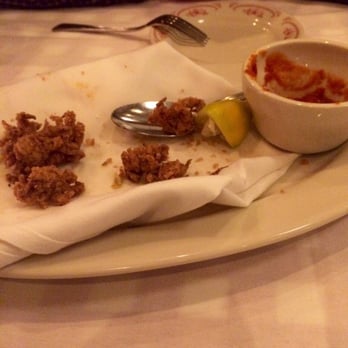 Maggiano's Little Italy - What's left of the Italian calamari appetizer. - Italian Near Me - Hackensack, New Jersey