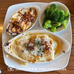 99 Restaurant & Pub - Stuffed haddock with sides of mac and cheese and broccoli