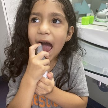 Teddy Bear Children's Dentistry - My daughter using her spray - Pediatric Dentists Near Me - West Hills, California Teddy Bear Children's Dentistry - My daughter using her spray - Pediatric Dentists Near Me - West Hills, California