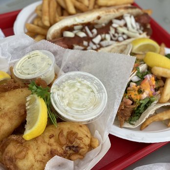 Captain's Cove Seaport - a tray of food - Bars Near Me - Bridgeport, Connecticut Captain's Cove Seaport - a tray of food - Bars Near Me - Bridgeport, Connecticut