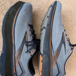 Central Shoe Repair - Sneakers showing one with an added lift.