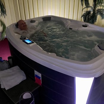Hot Tub Sales - Trying out the Spirit in the showroom - Hot Tub & Pool Near Me - Stuart, Florida Hot Tub Sales - Trying out the Spirit in the showroom - Hot Tub & Pool Near Me - Stuart, Florida