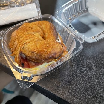 The Bean Bar - Croissant egg and gouda cheese sandwich w/ turkey bacon - Coffee & Tea Near Me - Tampa, Florida The Bean Bar - Croissant egg and gouda cheese sandwich w/ turkey bacon - Coffee & Tea Near Me - Tampa, Florida