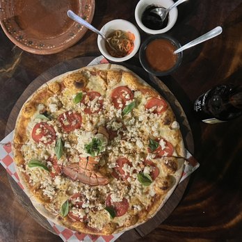 Roots - Lobster pizza. Must try with the salsas! - Pizza Near Me - Holbox, ROO Roots - Lobster pizza. Must try with the salsas! - Pizza Near Me - Holbox, ROO