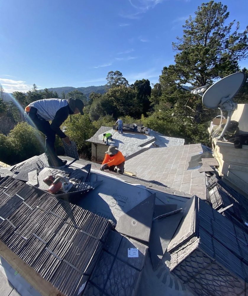 Slide of Exclusively Roofing