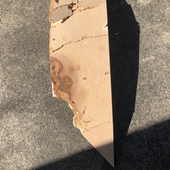 Pinole Floor Covering - Showing the particle board he removed - Flooring Near Me Pinole Floor Covering - Showing the particle board he removed - Flooring Near Me
