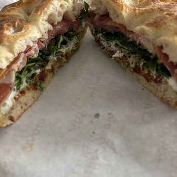 All’Antico Vinaio - L'ITALIANA $19 Prosciutto, Pistachio Cream, Stracciatella, Sun-Dried Tomato, Arugula - Sandwiches Near Me - Las Vegas, Nevada All’Antico Vinaio - L'ITALIANA $19 Prosciutto, Pistachio Cream, Stracciatella, Sun-Dried Tomato, Arugula - Sandwiches Near Me - Las Vegas, Nevada