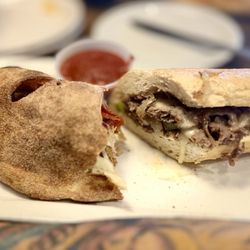Parry's Pizzeria & Taphouse - Half a Meat Calzone & half a cheesesteak sando