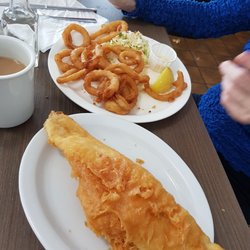 Jimmy's Fish and Chips - Fish was crispy on the outside and nice and tender on the inside the onion rings are all clumped together had to cut them with a knife