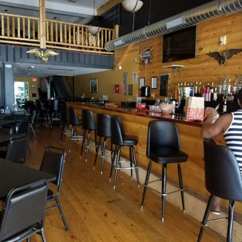 La Cabaña - a woman sitting at a bar - Mexican Near Me - Irvine, Kentucky La Cabaña - a woman sitting at a bar - Mexican Near Me - Irvine, Kentucky