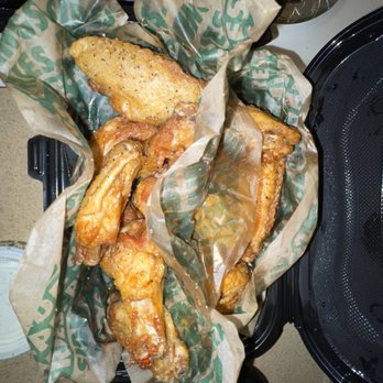 Wingstop - a basket of fried chicken wings - Chicken Wings Near Me - Frederick, Maryland