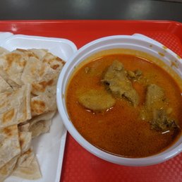 Roti Prata w/ Curry Chicken ($12.95) - 4 stars. The roti was buttery and flaky. Curry was good, low/medium spicy. Lunch 2022-