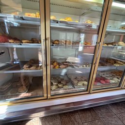 a display case full of donuts a display case full of donuts